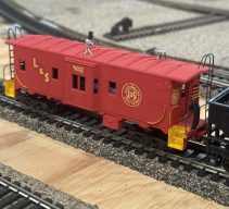 DICK HANNA'S CUSTOM BAY WINDOW CABOOSE IN LAURENBURG AND SOUTHERN RR. Work done by Dick Hanna. 