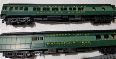Brandon Priestlie's custom Southern RR passeger cars with Modern Rails Decals applied to his custom paint job.